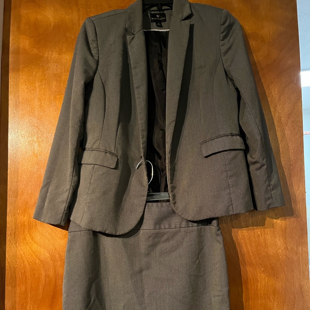 Black checked business suit.